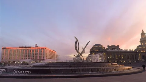 Fountain in the square at sunset in summer Stock Footage 82358570