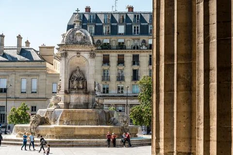 Fountain St Sulpice in front of the same named church in Paris Stock Photos