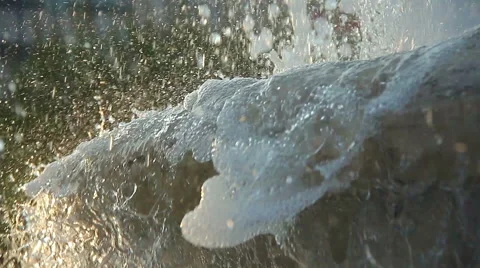 A fountain at sunset with backlit Stock Footage 49790988