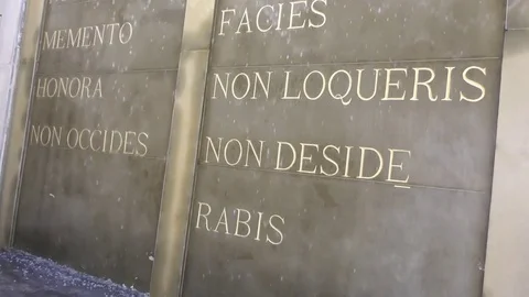 A fountain with the ten Commandments in Latin at Domus Galilaeae Stock Footage 78140815