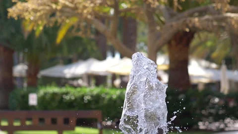 Fountain water going up and down in a park in slow motion 180fps Stock Footage 102510545