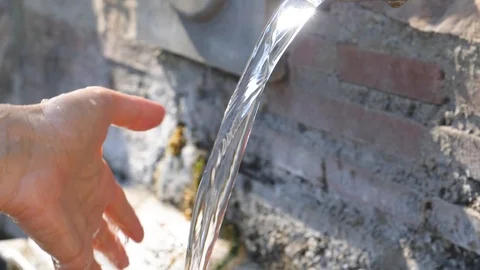 Fountain water on hand Stock Footage