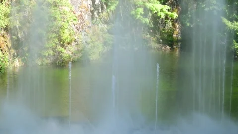 Fountain working in a day slowmo. Stock Footage 302253976