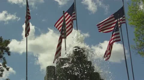 Fountains, American Flags, &amp; Puffy Clouds Video stock 11241362
