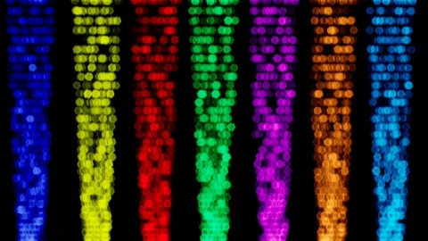 Fountains of fast multicolored particles that are blurred in bokeh. Seamless  Video stock 100431707