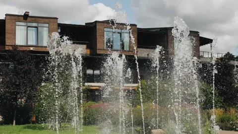 Fountains throw out a stream of water to the top Stock Footage 304992033