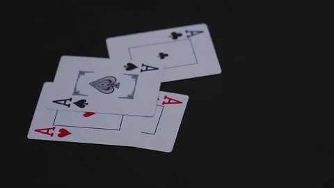 Four ace poker cards falling on the black table Video stock 77041872