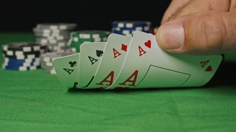 Four aces in his hands on the table Stock Footage 142204346