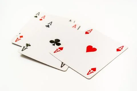 Four aces isolated on white background - casino gambling concept Stock Photos
