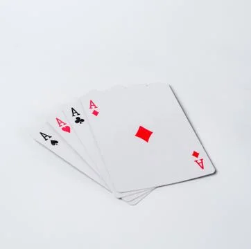 Four aces on a white background Stock Photos