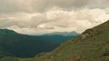 The four active people standing on a mountain 4k or 4k+ Resolution