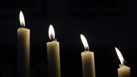 Four Advent candles are burning. Video stock 287710306