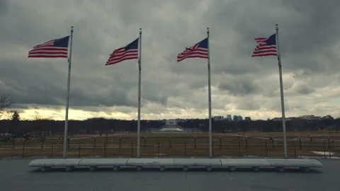 Four American Flags Waving In The Wind. Washington DC. 4K. Stock Footage 150605217
