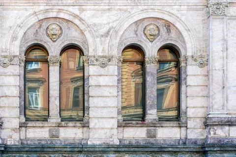Four arched windows. Stock Photos