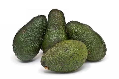 Four avocados. Stock Photos