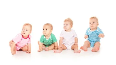 Four babies isolated Stock Photos