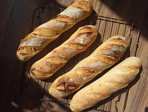 Four baguettes Stock Photos