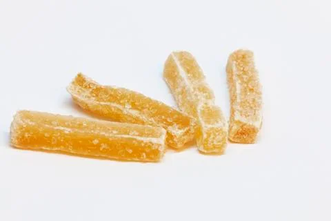 Four bars of ginger on white background Stock Photos