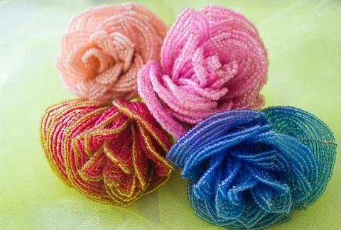 Four beaded roses Stock Photos