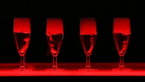Four beautiful glasses with bubbles smoke and drink Vídeo Stock 10889042