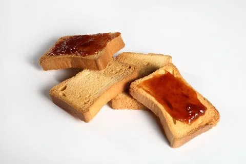 Four biscuits with jam on white Stock Photos