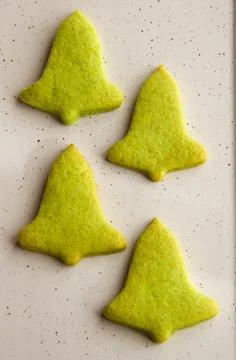 Four biscuits in the shape of bell for easter Stock Photos