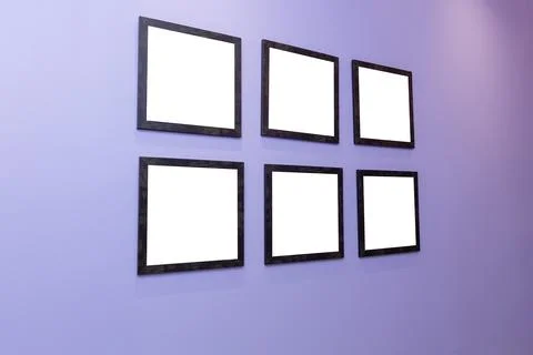 Four black frames on a purple wall with a white background. Stock Photos