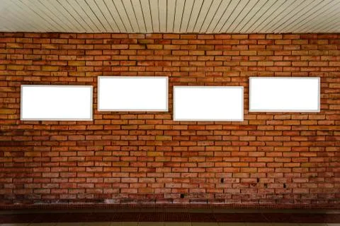 Four blank frame mock up on a brick wall. Stock Photos