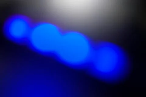 Four Blue Spots on  Grey Background Stock Photos