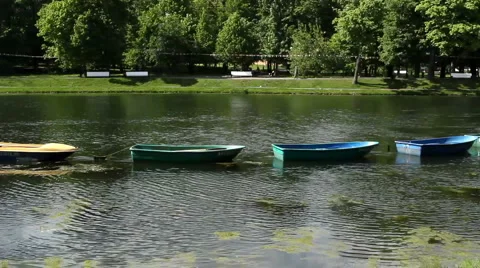 Four boats float Stock Footage 5504367