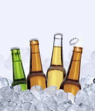 Four bottles of beer in ice cubes isolated on white background. 3d render Stock Illustration