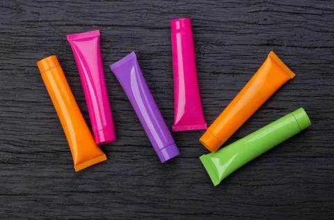 Four bright multi-colored 3D mo?kup tubes Stock Photos