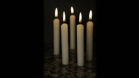 Four candles burning 스톡 동영상 64803669
