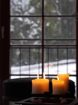 Four candles burning Stock Photos