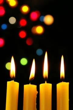 Four candles Stock Photos