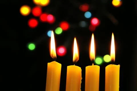 Four candles Stock Photos