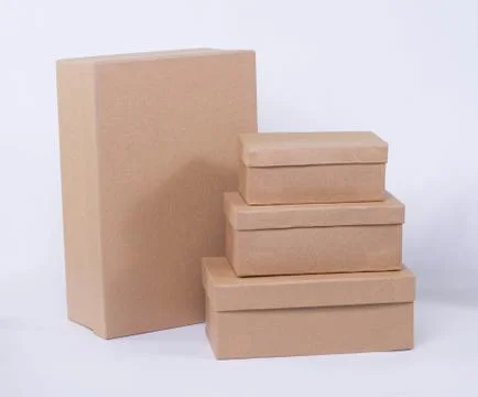 Four cardboard box isolated different size on white background Stock Photos