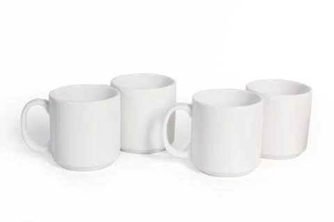 Four Ceramic Cups Isolated on White Background, Side View Stock Photos