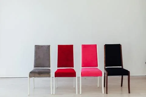 Four chairs in the interior of an empty white room 스톡 사진