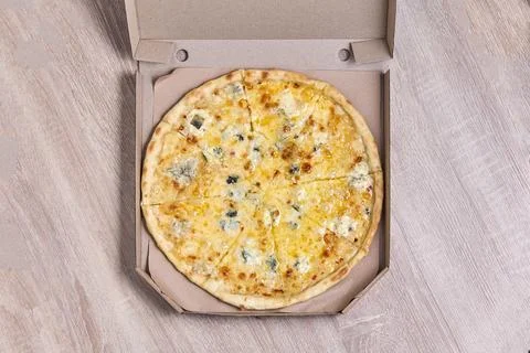 Four Cheese Pizza in a Takeaway Box Stock Photos