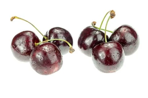 Four cherry berries isolated on white background Stock Photos