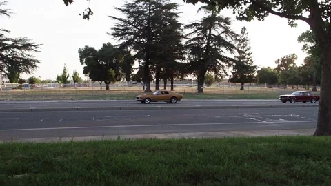 Four Classics cars in a row Stock Footage 279864604