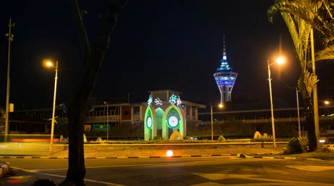 Four Clocks Featuring Arabic Numerals on a Roundabout in Alor Setar. Menara at Stock Footage 66260358