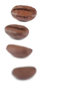 Four coffee beans Stock Photos