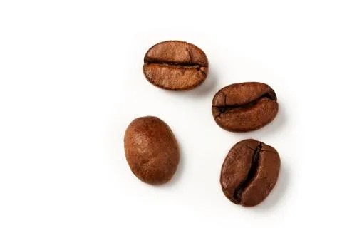Four coffee beans from top Stock Photos