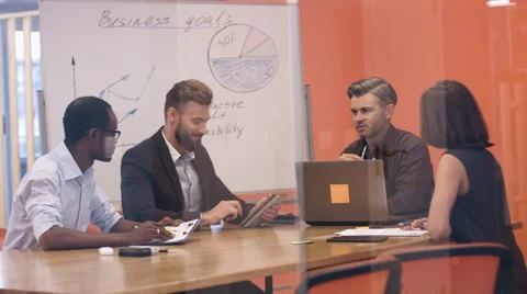 Four colleagues working together Stock Footage 68351714