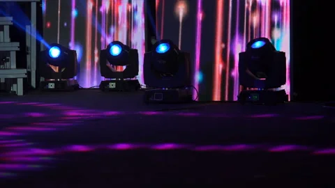 Four colored projectors on the stage lights farm. Bright shiny stage lights Stock-Footage 160712733