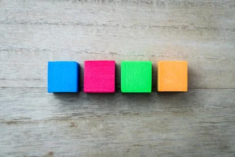 Four colored square blocks Stock Photos