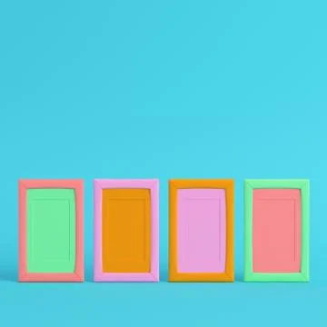 Four colorful blank frames on bright blue background in pastel colors Stock Illustration