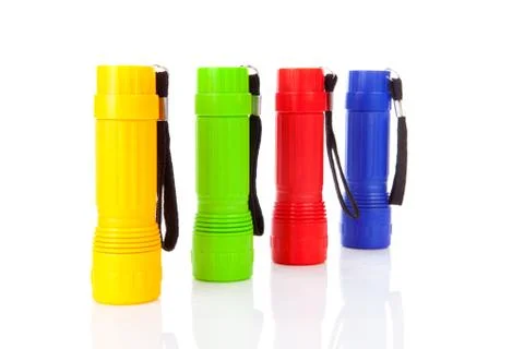 Four colorful flashlights Stock Photos